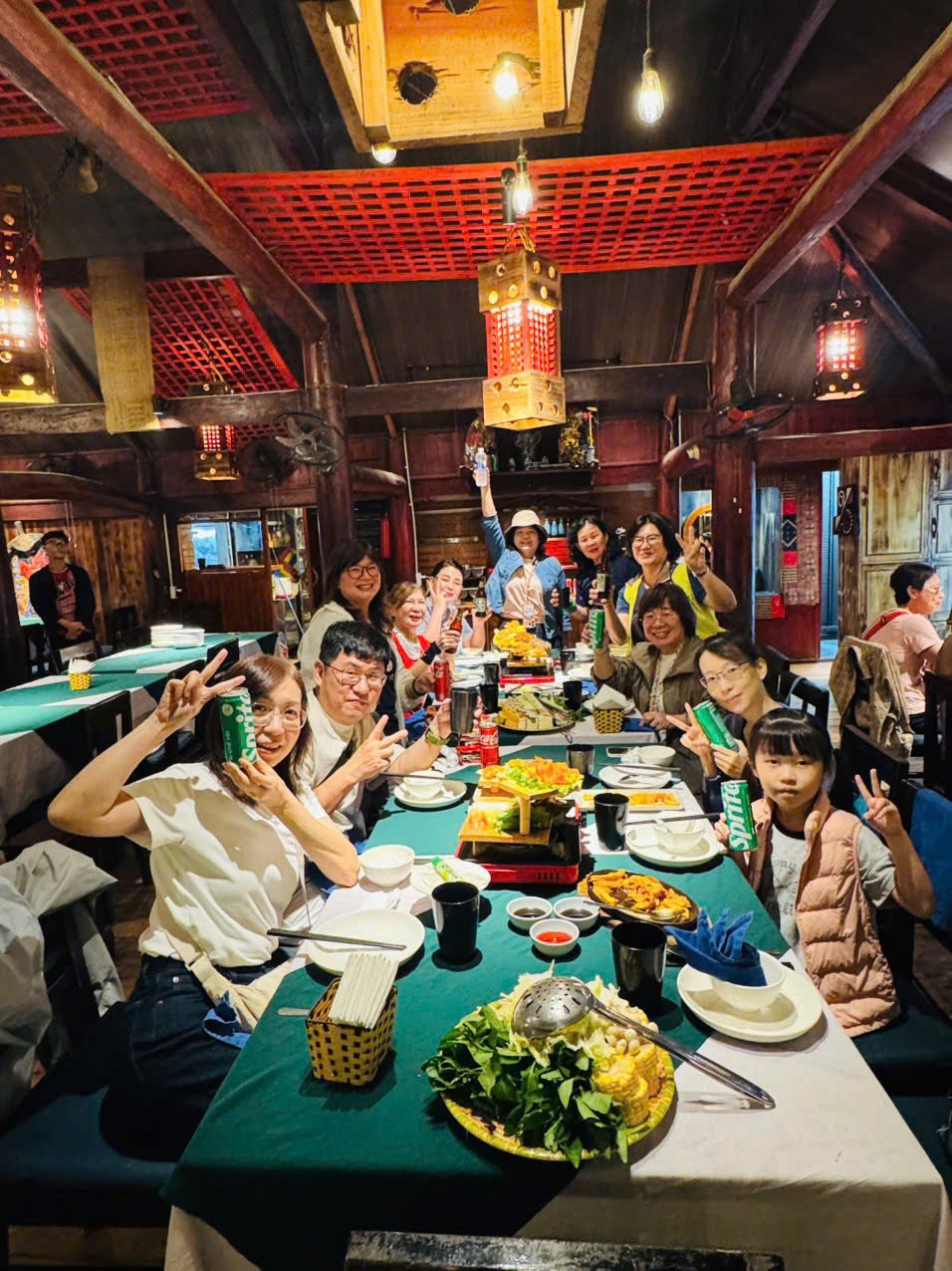 Travellers sharing a Vietnamese meal